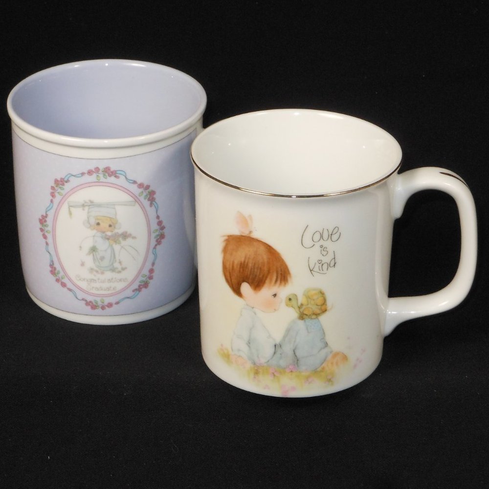 2 coffee mugs. Precious Moments
